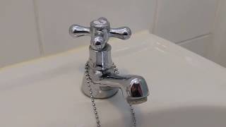 How To Fit New Basin Taps [upl. by Ahsenid]